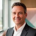M. de Vries in een zakelijke kantooromgeving